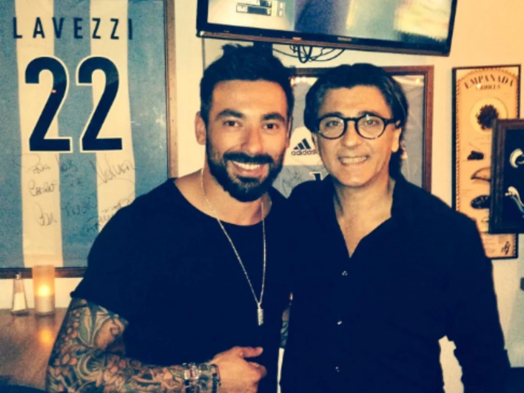 Volver restaurant owner Carlos Muguruza (right) hosts famous athletes like soccer legend Ezequiel Lavezzi (left) in Paris