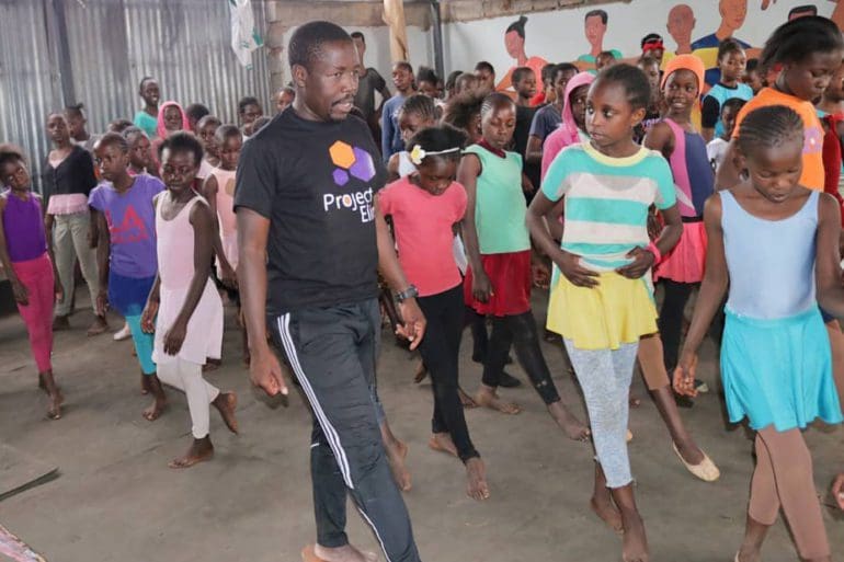 Mike Wamaya leads a dance class at Project Elimu. Hundreds of students have passed through his doors, learning life and social skills in addition to dance