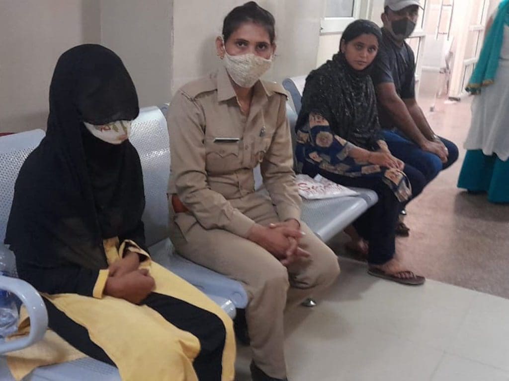 Seema, whose name has been changed to protect her identity, waits for justice at the police station after being raped multiple times.