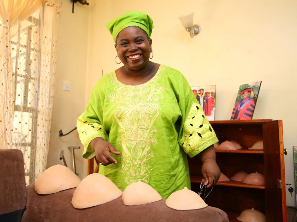 Dr. Mary Mugambi, a four-time cancer survivor and lecturer at the Technical University of Kenya, shows the prosthetic silicone breasts she develops for breast cancer survivors