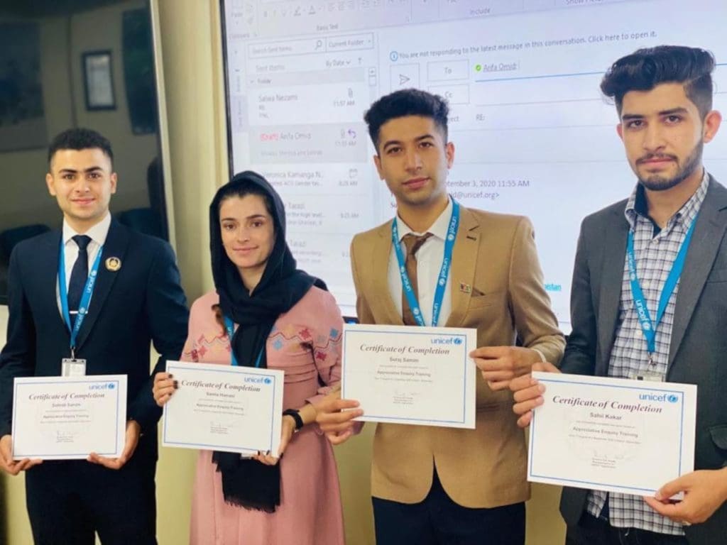 Suraj (center-right), along with other Afghani young adults, participated in a UNHCR program which ultimately allowed him to relocate to Buenos Aires, Argentina to study international relations.