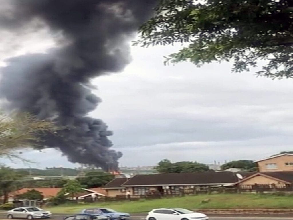 A screen grab from a video showing an explosion at Engen Oil Refinery left the facility engulfed in flames and black smoke.
