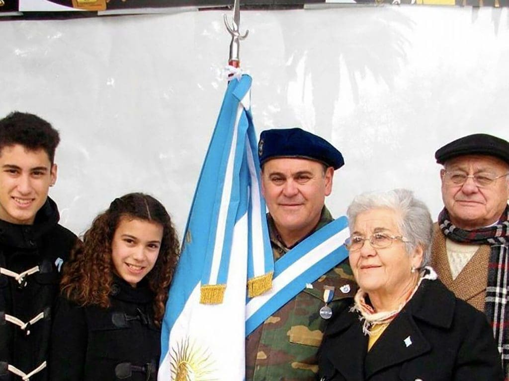 War veteran Oscar Bauchi, in his uniform, photographed with his children Bernardo and Juana, and his parents Ceferino and Marta.
