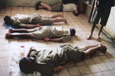 Boys are made to lay face down at a Troubled Teen Industry compound. Photo courtesy WWASPS Survivors.